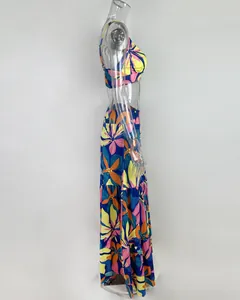 Side view of floral print two-piece dress set with crop top and tiered long skirt