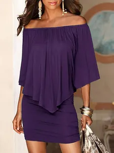 Close-up showing the detail of a purple off-shoulder bodycon dress with ruffles