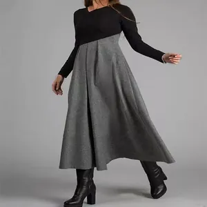 Detailansicht des Woll-Maxikleides mit Patchwork-Farblock und unregelmäßigem Saum