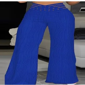 Detail view of high waist wide leg pants with water ripple texture and hollow design