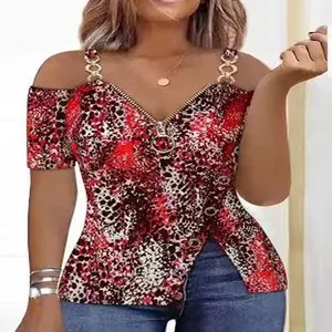 Detail of a women's zipper V-neck top featuring leopard print and gold chain straps.