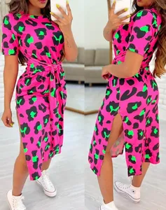 Vibrant pink leopard print dress with short sleeves, waist tie and side slit detail