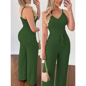 Elegante donkergroene set met V-hals top en wijde broek met hoge taille en textuur