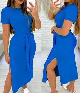 Close-up of royal blue short sleeve maxi dress with tie-waist and side slit detail