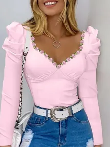 Elegant pink puff sleeve V-neck top with delicate floral embroidery for women’s fashion