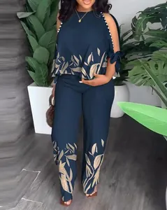 Completo due pezzi blu navy con stampa a foglie e perline sulle spalle per le donne