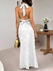 Back view of a white Y2K halter neck top and long skirt set for summer