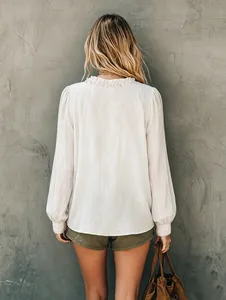 Back view of a minimalist white ruffled collar long-sleeve blouse with puff sleeves.