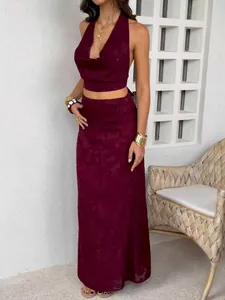 Full detail view of a stylish burgundy Y2K halter top and maxi skirt set for women