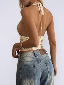 Back view detail of Y2K beige lace halter top with gold embroidery