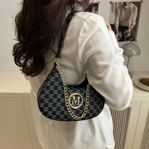 Fashionable retro monogram printed shoulder bag for women with a gold chain strap