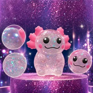 Jouet de décompression axolotl rose pailleté doté d'un adorable petit visage souriant