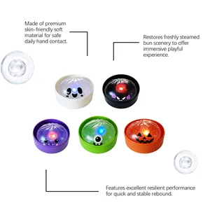 Detailed view of Halloween glowing bun squeeze toys showing soft skin-friendly material