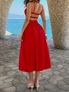 Rotes Resort-Maxikleid mit Spaghettiträgern, offenem Rücken und fließender Silhouette