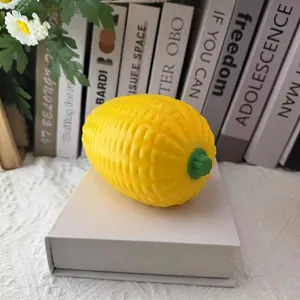 Close-up of large realistic yellow corn squishy toy with slow rebound texture for stress relief.