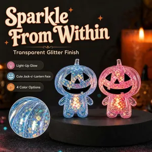 Two colorful light-up glitter pumpkin figures for Halloween party decorations and gifts