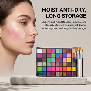 Vue détaillée de la palette de peinture multicolore visage et corps avec pinceaux pro.