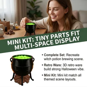 Miniature witch cauldron set with green potion and campfire base for Halloween decor.