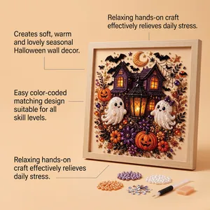 Detailed close-up of a DIY Halloween ghost and pumpkin diamond painting art kit.