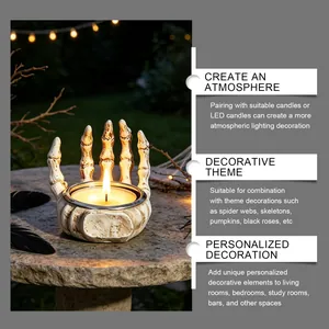 Skeleton hand candle holder detail with warm tea light for Halloween outdoor decoration