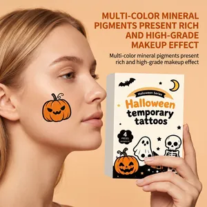 Close-up detail of Halloween pumpkin temporary tattoo on face and product packaging box