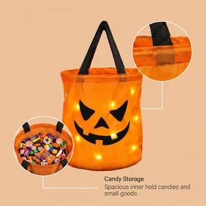 Detailed view of LED Halloween pumpkin bucket showing spacious interior for candies.
