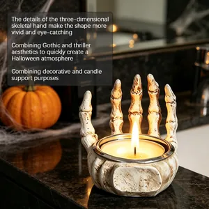 Detailed view of 3D skeletal hand candle holder creating a Gothic Halloween vibe