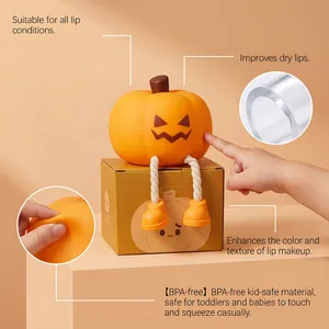 Detail view of BPA-free squishy pumpkin container showing soft texture and lip care features