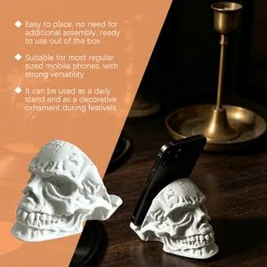Supporto per telefono a teschio in resina bianca come decorazione festiva di Halloween