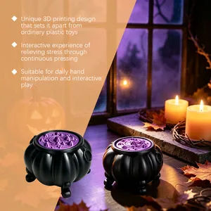 Close-up of a 3D printed witch cauldron stress relief toy for Halloween atmospheric play
