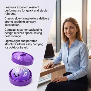 Detail view of purple Halloween ghost squishy bun in compact steamer packaging for stress relief