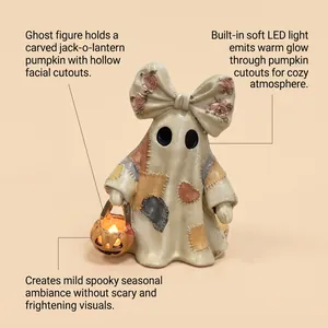 Detailed view of vintage patchwork ghost figurine with a warm LED glowing pumpkin light.