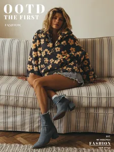 Warm and cozy fleece flower sweatshirt for women in a stylish lifestyle home setting