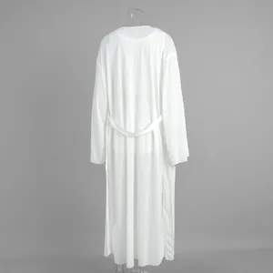 Back view of a semi-transparent white floor-length beach robe with belted waist detail.