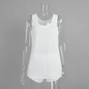 Detailed view of white translucent beach set including tank top and matching shorts