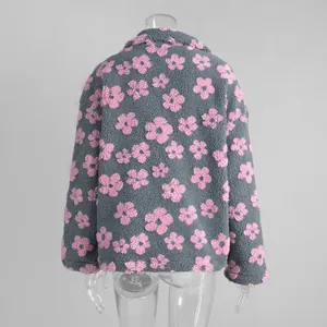 Detailed back view of a cozy gray fuzzy sherpa jacket with pink floral pattern.