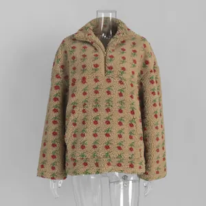 Detailed view of a floral pattern sherpa fleece pullover sweatshirt on a mannequin