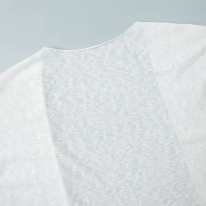 Detailed macro view of white semi-transparent lightweight breathable fabric for beachwear