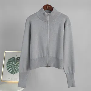 Elegant gray knit cardigan featuring a high neck and double zipper for a slim fit look
