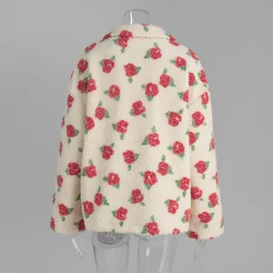 Back view of a cozy off-white fleece sweatshirt featuring a vibrant red rose floral pattern