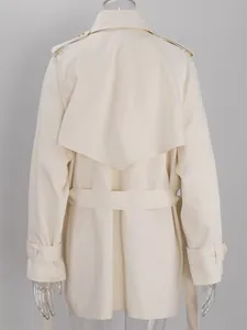 Detailed back view of a cream mid-length trench coat featuring a storm flap and waist belt
