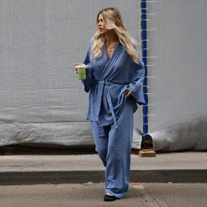 Women's blue cotton gauze long-sleeve pajama set with a wrap top and wide pants