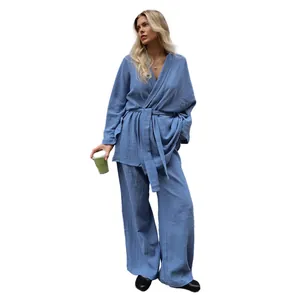 Blue cotton long-sleeve pajama set for women, comfortable loose loungewear for home.