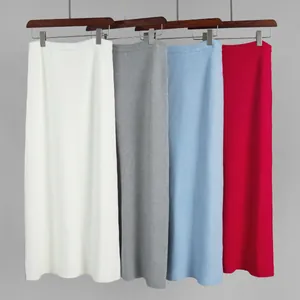 Vertical ribbed knit midi skirts shown in four colors white grey blue and red finish.