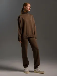 Women's chic brown mock neck sweater and matching knit pants two-piece set outfit