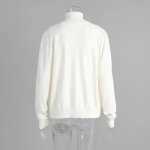 Back view detail of white knitted cardigan sweater with ribbed turtleneck and cuffs
