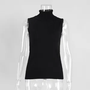 Close-up detail of a minimalist black sleeveless knitted turtleneck vest on mannequin