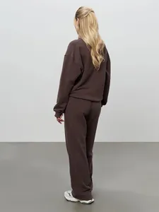 Back view of a comfortable chocolate brown tracksuit set for casual autumn wear