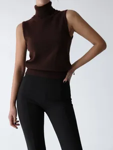 Detailed view of the dark brown sleeveless turtleneck knit sweater for women.