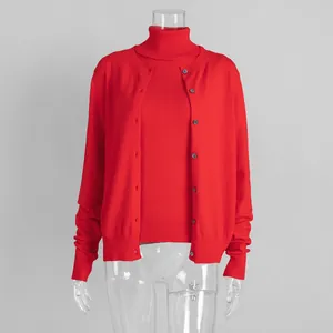 Red knitwear set featuring a high neck sleeveless top and a matching button-up cardigan